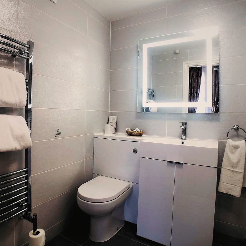 Modern en-suite with heated towel rail