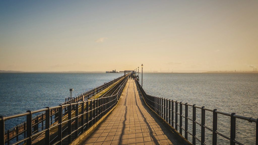 Southend Pier stretching into the estuary at golden hour