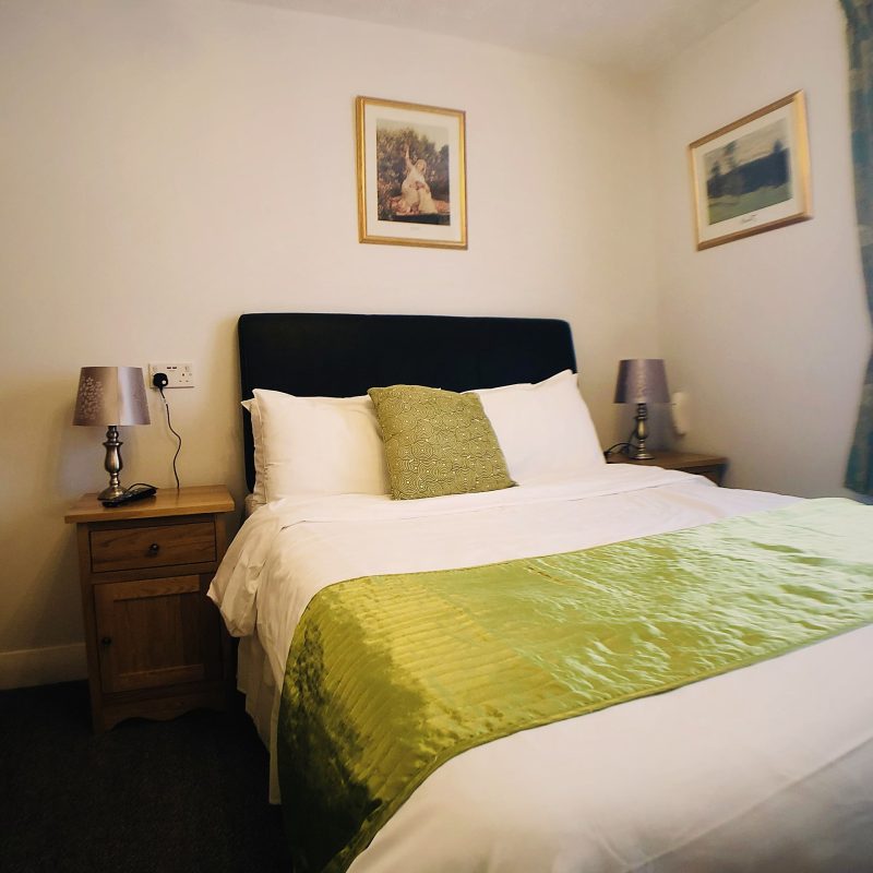 Double room with sage bed runner